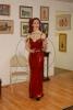 Jeanne X heated the room up in this little red number.